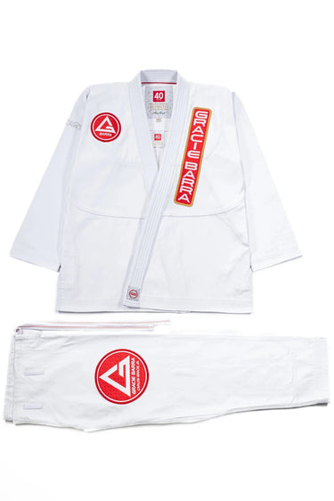 40 Year Anniversary Women's Kimono flat lay of jacket and pants with Barra Shield, Gracie Barra Patch, and Legacy G detail