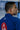 Gracie Barra professor wearing the blue Axis Kimono by adidas showing the back Red Shield logo and adidas mark inside a Gracie Barra school