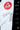 White AXIS Kimono by adidas pants close-up showing red Gracie Barra shield, gray adidas three stripes, and redesigned seat and hip construction for improved mobility.