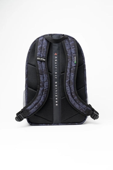 Back view of the Barra Beachwalk Backpack in black, showing padded shoulder straps, ventilated mesh back panel, and Brazilian Jiu-Jitsu wordmark strap