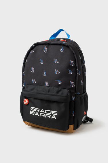 Jiu Jitsu Kids Backpack in Black/Grey with illustrated jiu-jitsu pattern, blue top handle, Gracie Barra logo patch, and brown suede bottom panel