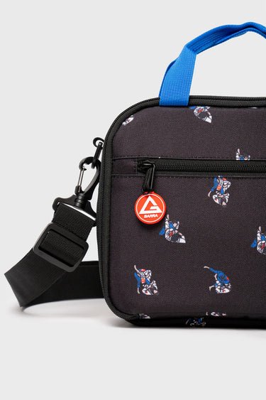 Close-up of black Jiu-Jitsu lunchbox front pocket with Gracie Barra zipper pull and clipped-on shoulder strap