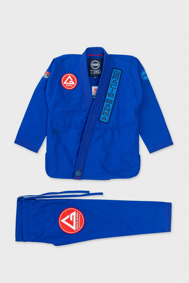 Blue Gracie Barra Ripstop Lightweight Kimono jacket and pants laid flat, showing red GB chest patch and shoulder embroidery