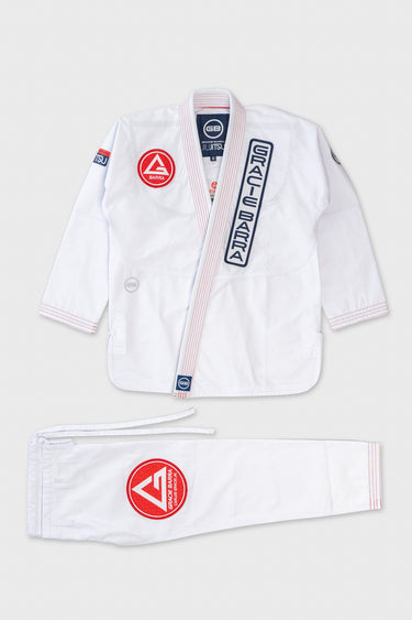 Front view of the white Ripstop Lightweight Kimono jacket and pants laid flat, with red Gracie Barra chest patch, red-and-white striped lapel, and matching red logo patch on the pants