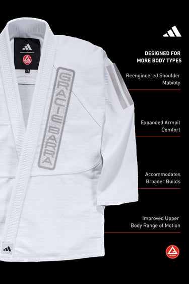 Womens AXIS Kimono by adidas in white, jacket layflat with gray Gracie Barra lapel patch, adidas shoulder stripes, and shoulder mobility feature callouts.
