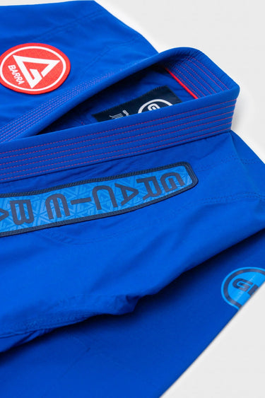 Close-up of the blue Ripstop Lightweight Kimono collar with embroidered Gracie Barra lapel branding and red contrast stitching