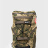 Front view of the camo Tactical GB4 Backpack Compact with bungee cord front panel, GRACIE BARRA rubber patch, red Barra shield, and side mesh pocket